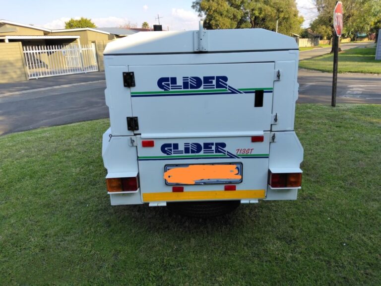 Rear view of white Glider luggage trailer