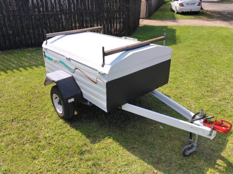 Front side view of Pony trailer with tow bar